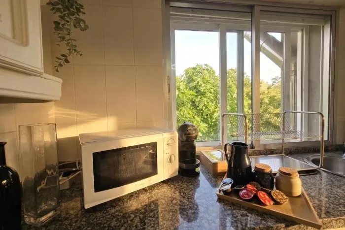 Kitchen with microwave and views
